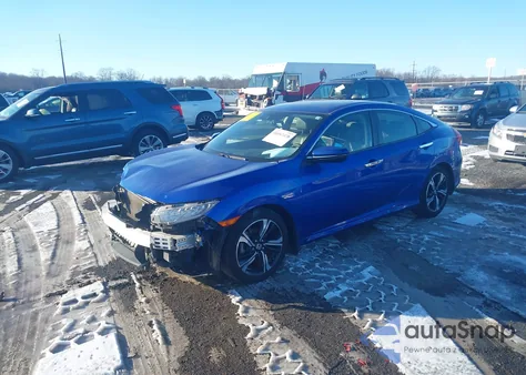 2018 Honda Civic Touring z USA, uszkodzony, nr VIN JHMFC1F95JX017753